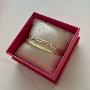 29. House of Harlow Brass two separate stretchy bracelets